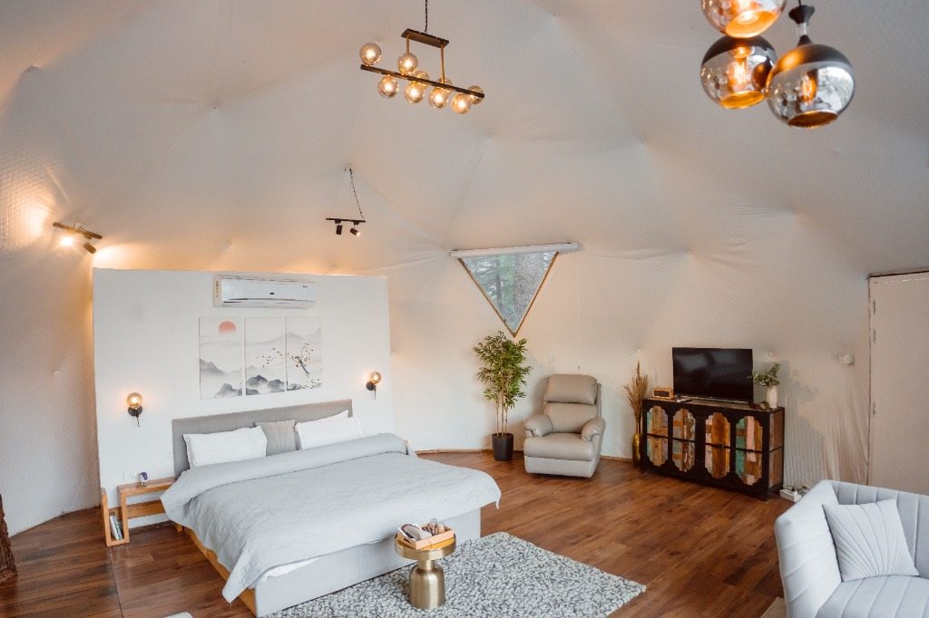 Luxury geodesic dome master bedroom